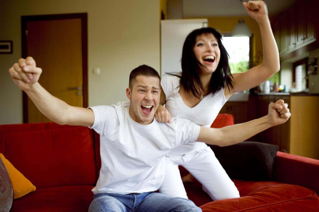 Man,And,Woman,Watching,Tv,Together