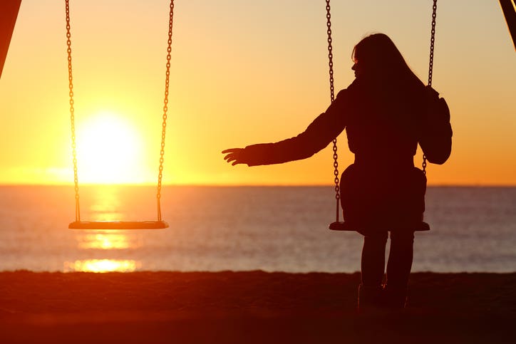 woman on swing by herself