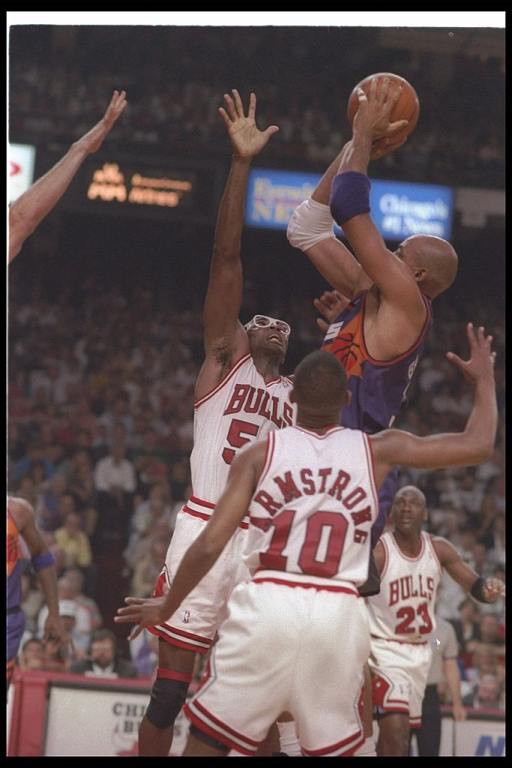 Forward Charles Barkley of the Phoenix Suns goes up for two during a game against the Chicago Bulls