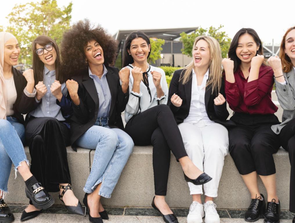 Portrait multiracial business women happy, winning, celebration gesture, outdoors, friends concept