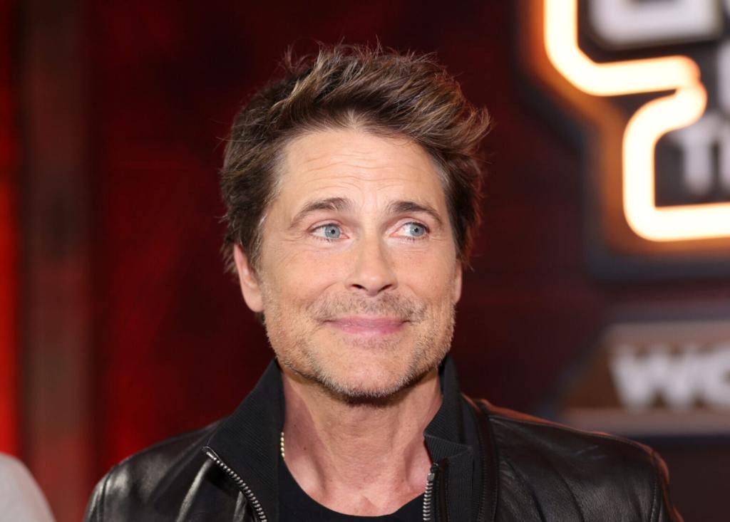 Rob Lowe attends the Guardians of the Galaxy Vol. 3 World Premiere smiling right wearing a black leather jacket.