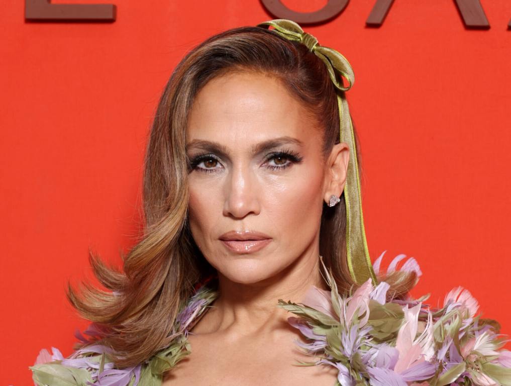 Jennifer Lopez attends the Elie Saab Haute Couture Spring/Summer 2024 show wearing a floral gown.