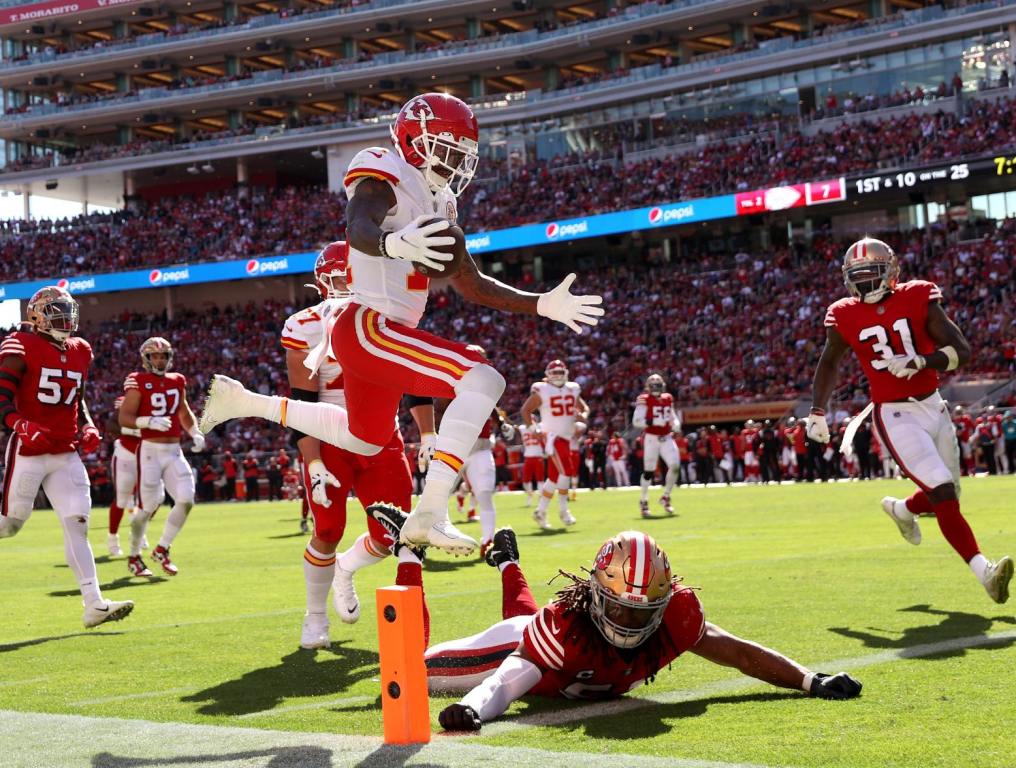 Mecole Hardman #17 of the Kansas City Chiefs scores a touchdown in the second quarter against the San Francisco 49ers at Levi's Stadium on October 23, 2022 in Santa Clara, California