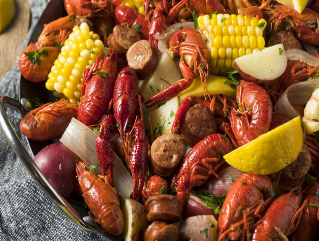 Homemade Southern Crawfish Boil with Potatoes Sausage and Corn; Cajun Food Las Vegas concept.