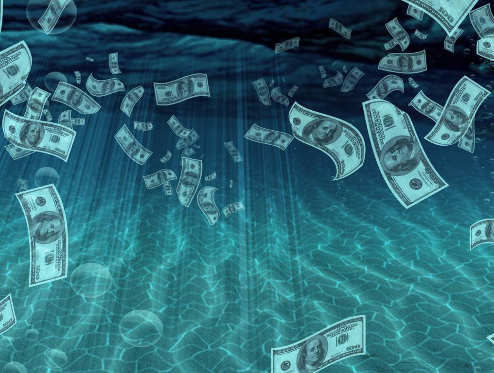 money floating under water