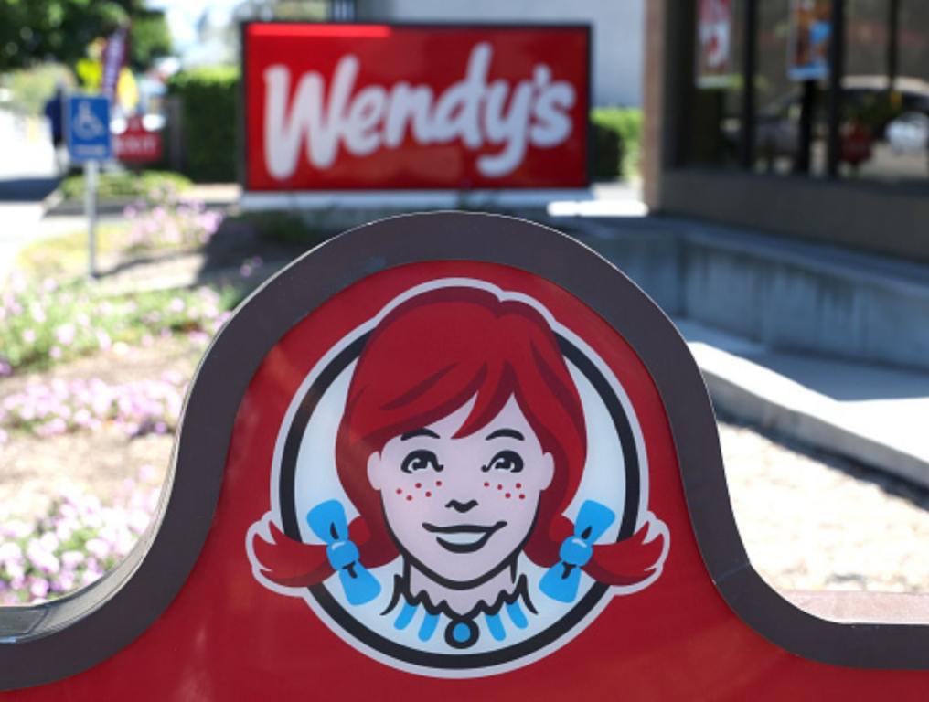 A sign is posted in front of a Wendy's restaurant on August 10, 2022 in Petaluma, California.