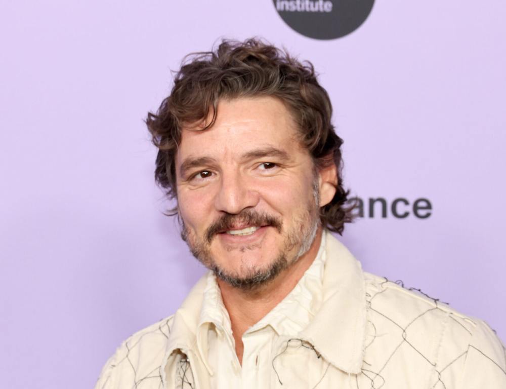 Pedro Pascal attends the "Freaky Tales" Premiere during the 2024 Sundance Film Festival smiling wearing a cream-colored jacket and shirt, Pedro Pascal: 'Buffy' Residuals Saved Him From Homelessness.