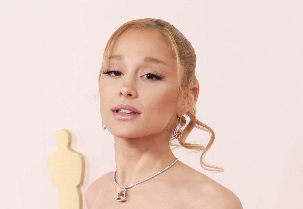 Ariana Grande attends the 96th Annual Academy Awards wearing a baby pink strapless dress, Ariana Grande Tells Fans To Leave Ex-Husband Alone