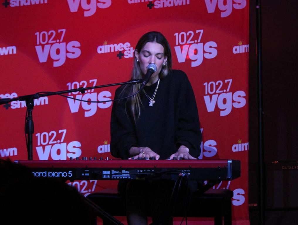 Charlotte Cardin on the keyboard and singing