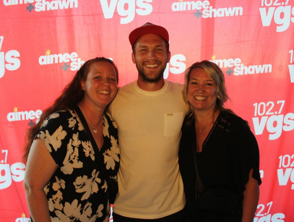 A meet-and-greet photo with fans and Phillip Phillips