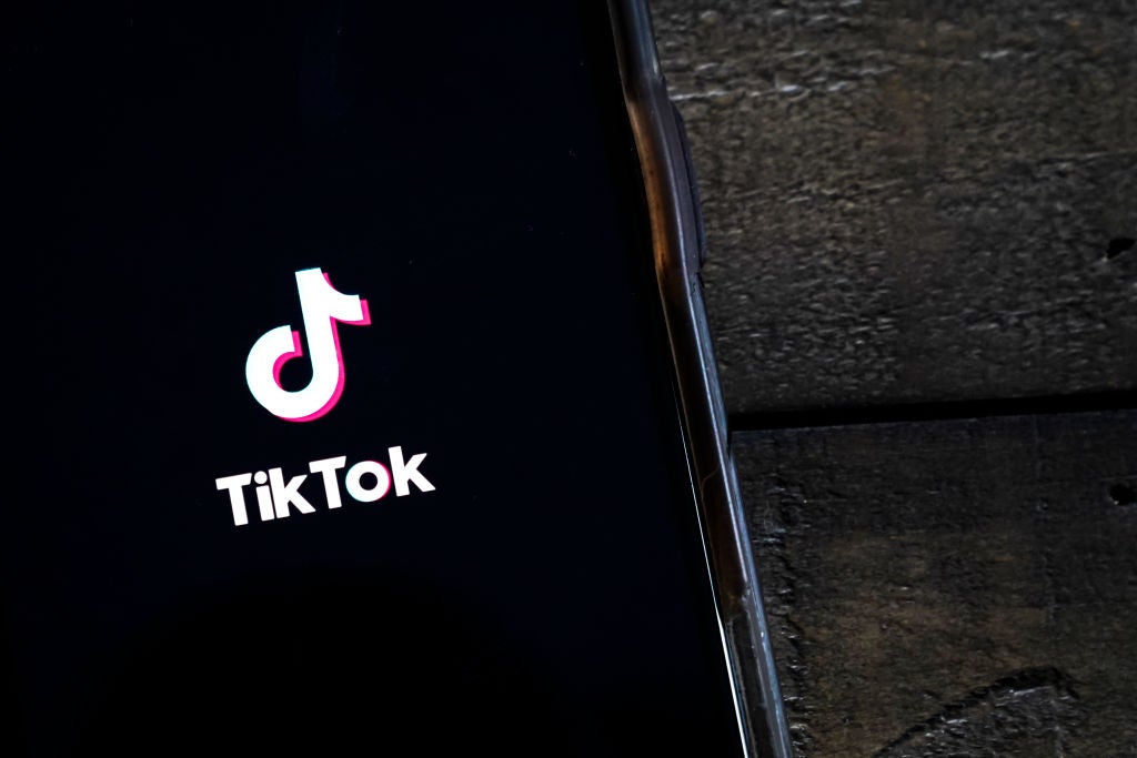 Image of TikTok on a cell phone. Here are some TikTok dos and dont's from experts. Hopefully by incorporating a few of these things into your content, your content will thrive.