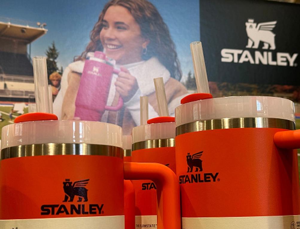 Stanley tumblers are displayed on a shelf at a Dick's Sporting Goods store