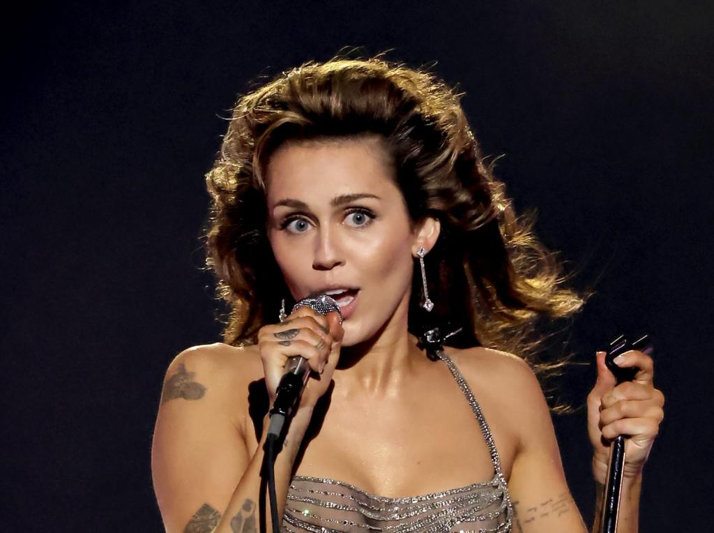 Miley Cyrus performs onstage during the 66th GRAMMY Awards, Miley Cyrus Opens Up About Complex Family Dynamic.