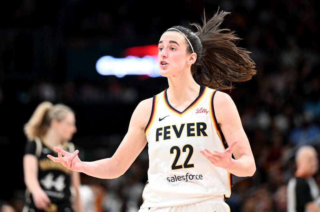 Caitlin Clark #22 of the Indiana Fever reacts to a call in the fourth quarter against the Washington Mystics at Capital One Arena. Caitlin Clark is being left off Team USA in the 2024 Summer Olympics, and she has the perfect response to it.