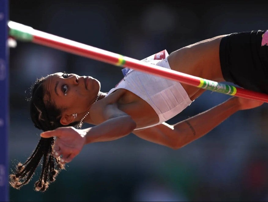 vashti cunningham jumping over high jump bar