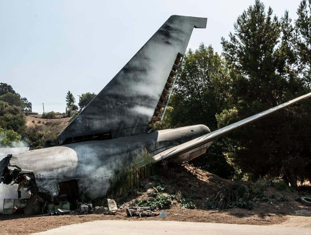 an airplane tail in a plane crash site fake accident at Harry Reid Airport