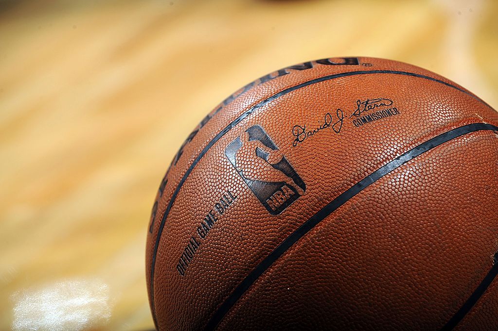 NBA basketball on a court. Drawing every NBA team logo by memory.