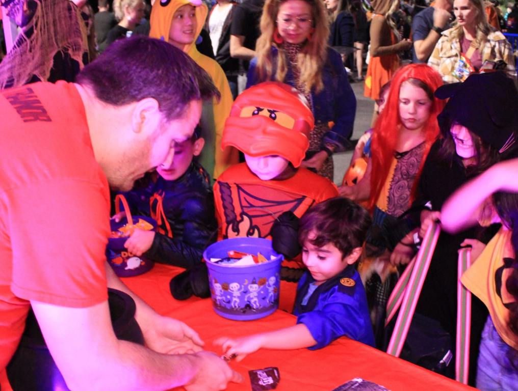 Shawn handing out candy