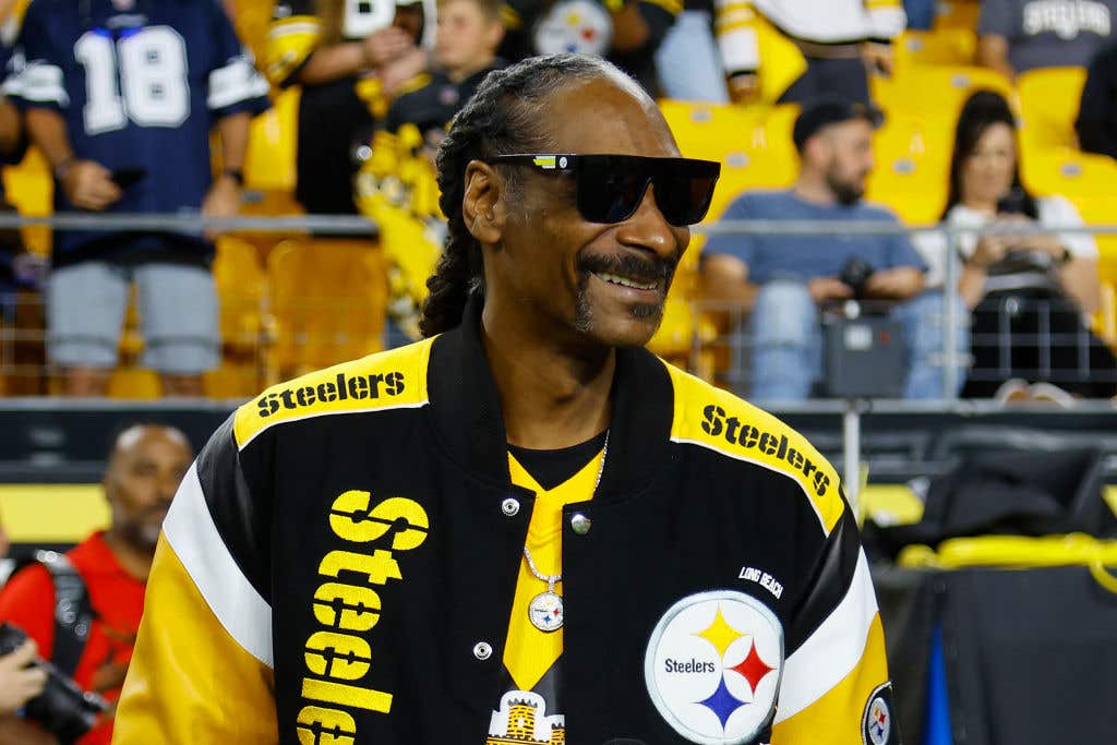 Snoop Dogg in a Stealers jacket.