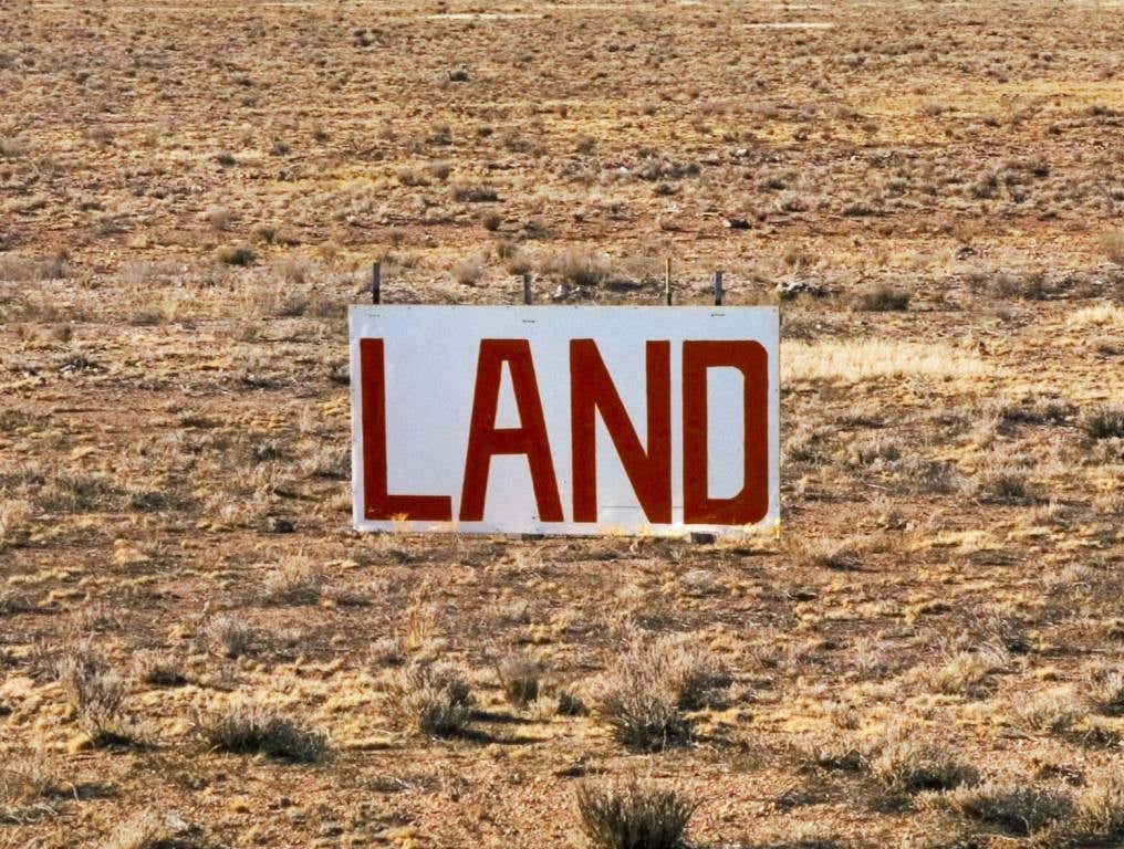 blm land sale sign in desert