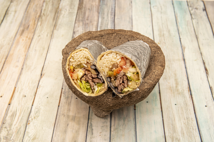 burrito cut in half on plate