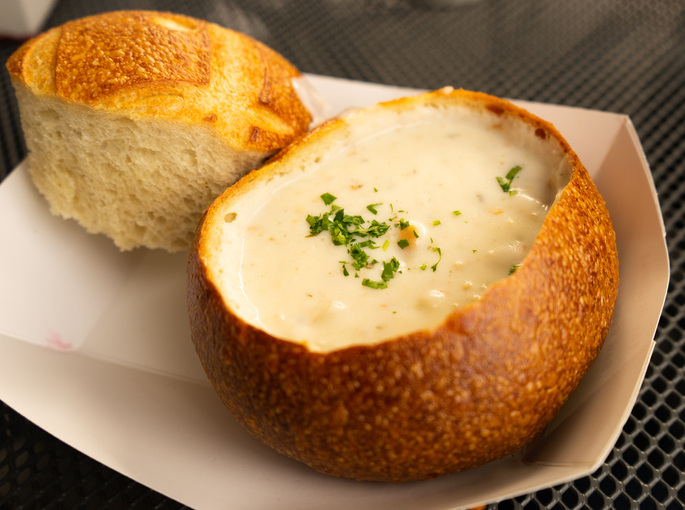 clam chowder in an edible sourdough bread bowl